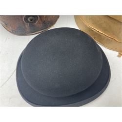 Early 20th century silk top hat, inscribed Thomas Moore, Hatter and Hosier, Scarborough, in heather lat box, together with a Thomas Townend & Co black bowler hat, in card hat box