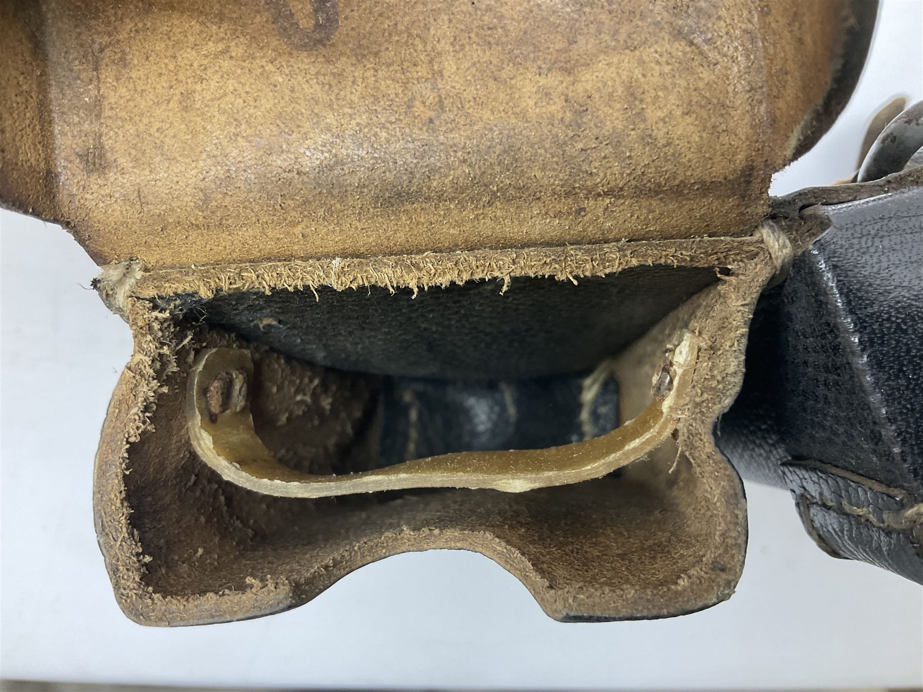 WW2 German 'SS' leather belt with six pouches (one containing unused field bandage) and buckle inscribed 'Meine Ehre Heifst Treue'; belt marked 0/0836 0029