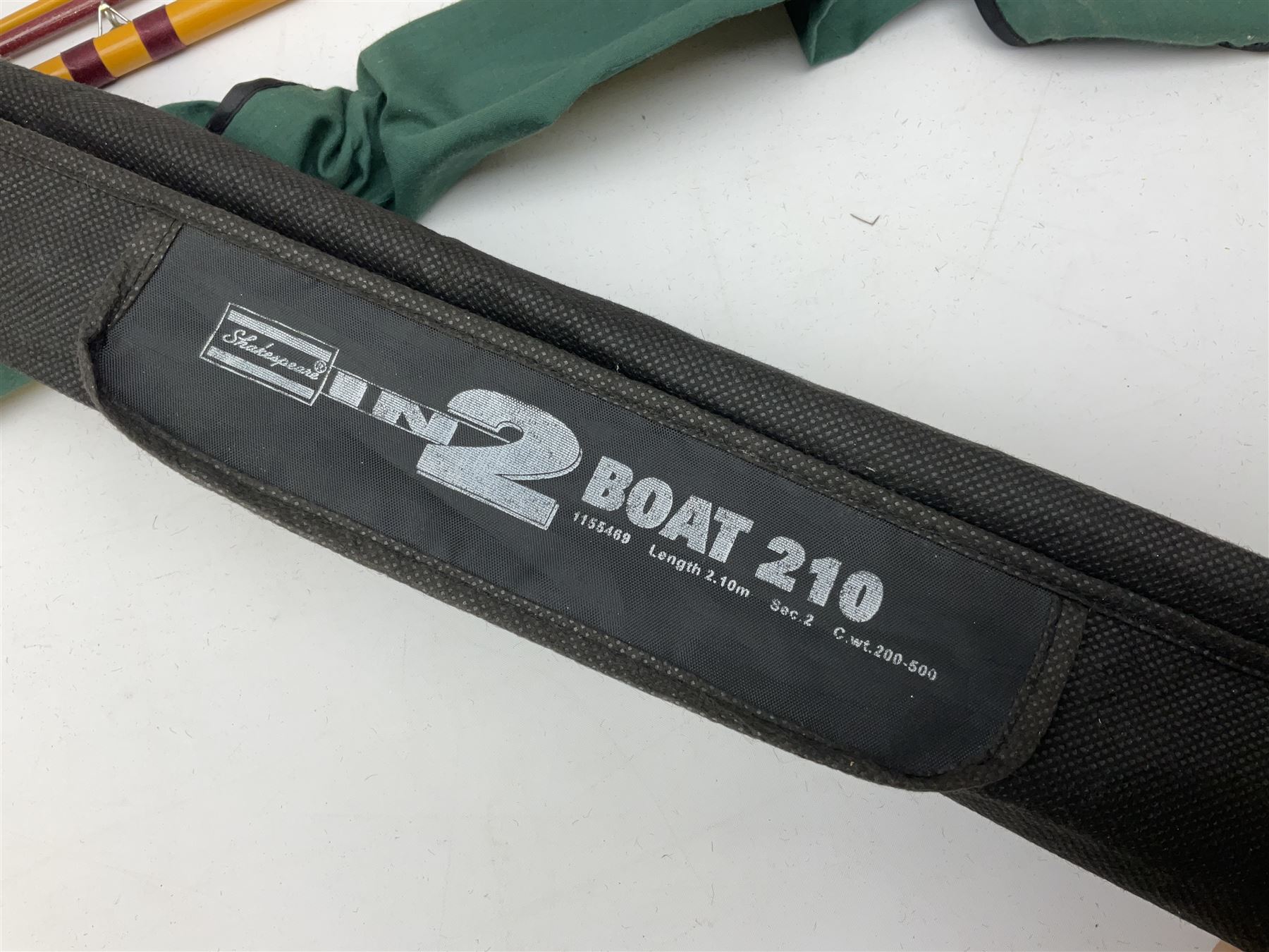 Quantity of fly and sea fishing rods and accessories, to include Shakespeare Boat 210 rod, Daiwa rod and others, and Guang Zhao FLD9000 course fishing reel, Beachmaster 7000FD, Rimfly II amd Penn Super Mariner, tackle etc