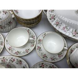 Minton Spring Bouquet pattern dinner and tea service, comprising dinner plates, twin handled tureens with covers, meat platter, teapot, milk jug, sugar bowl with cover, tea cups and saucers, bowls, cake plate, side plates, dessert plates, etc all with printed mark beneath (82)