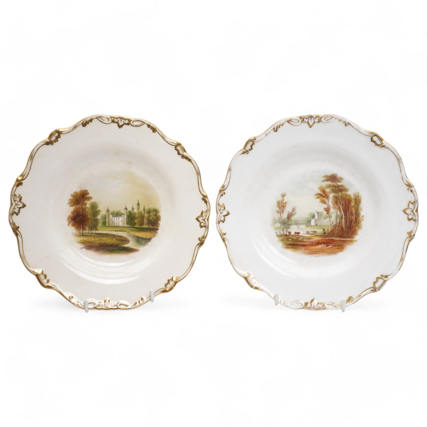 Set of five Derby plates with painted landscapes by Henry Lark Pratt, within gilt detailed swept boarders, the scenes comprising 'Brougham Castle - Northumberland' 'Eglinton Castle' 'Tivoli' and 'Blickling - Norfolk', with painted titles to base, pattern no. 3351 (5)