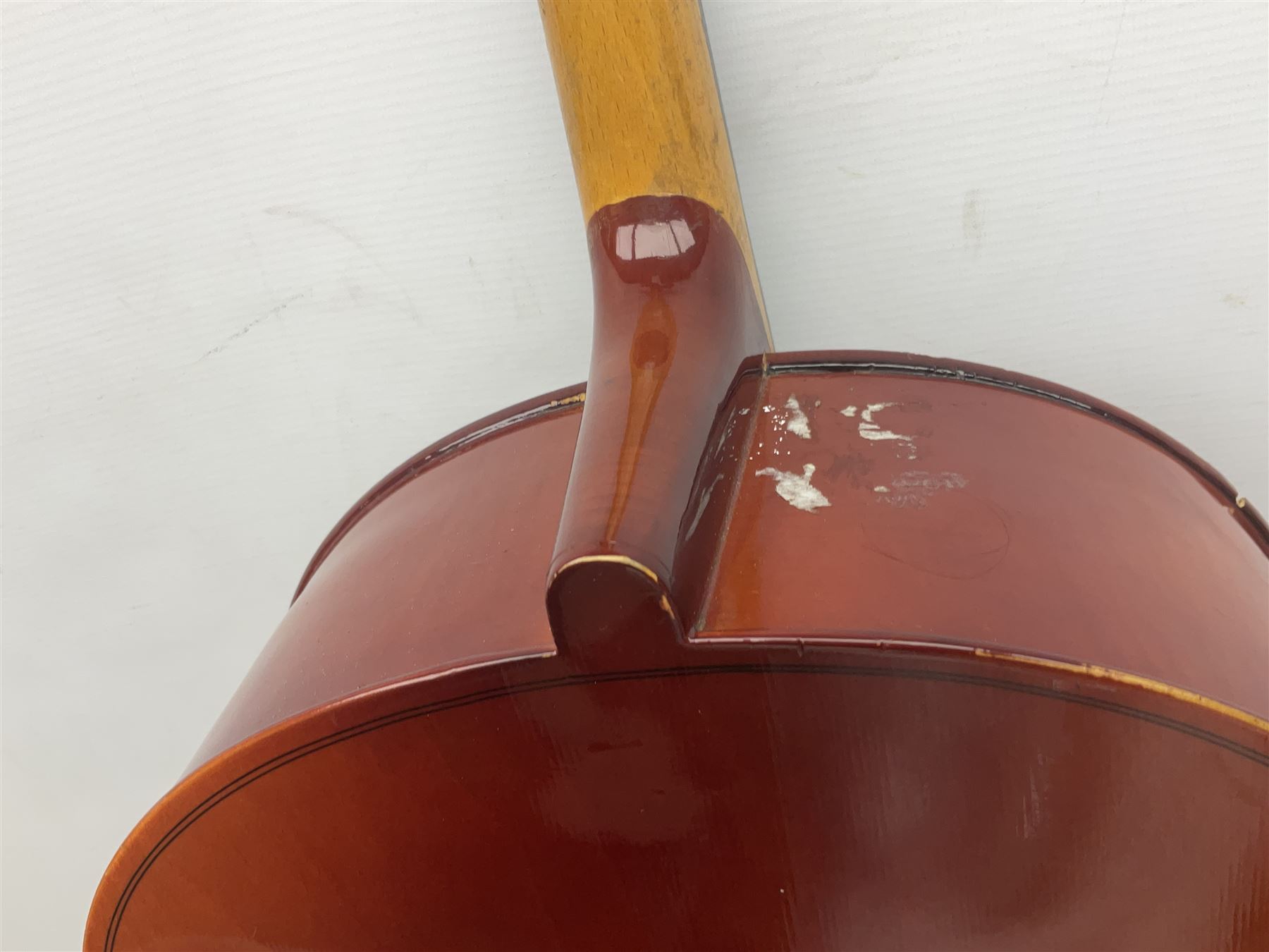 Two student half-size cellos - Boosey & Hawkes Artia with 65cm one-piece back and spruce top; bears maker's label; L104cm overall; and Romanian with 65.5cm two-piece maple back and ribs and spruce top; bears label; L108.5cm overall; each in soft carrying case with two bows (2)