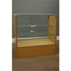  Light wood and glazed shops display cabinet enclosed by sliding glass doors, with two glass shelves and drawer, W91cm, H91cm, D50cm - no key  