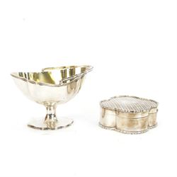 Early 20th century silver trinket box, of quatrefoil form, with shaped rim and engine turned decoration to cover, with vacant circular cartouche, hallmarked Deakin & Francis, Birmingham 1917 or 1942, H3cm, W8.5cm, together with an early 20th century silver swing handled sugar basket, with gilt interior, hallmarked Levi & Salaman, Birmingham 1918