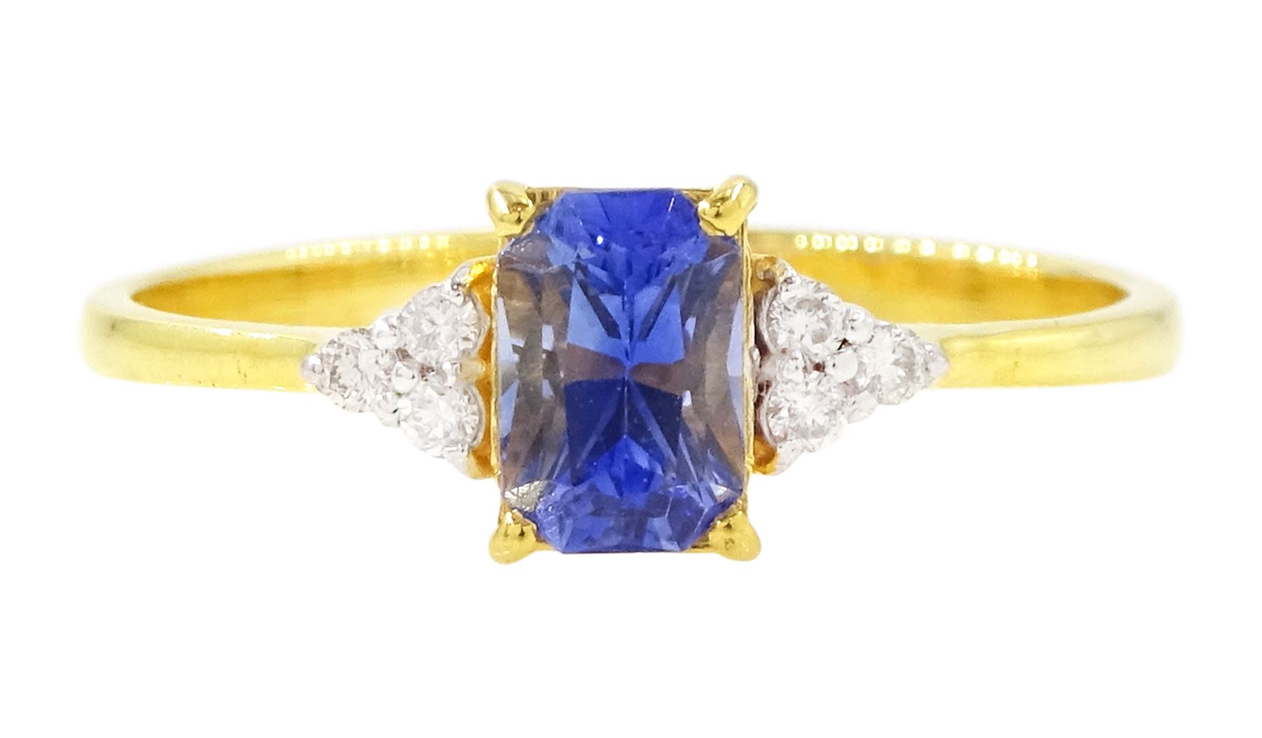 14ct gold Ceylon sapphire and diamond ring, single radiant cut sapphire of approx 0.75 carat, with three round brilliant cut diamonds set either side, stamped
