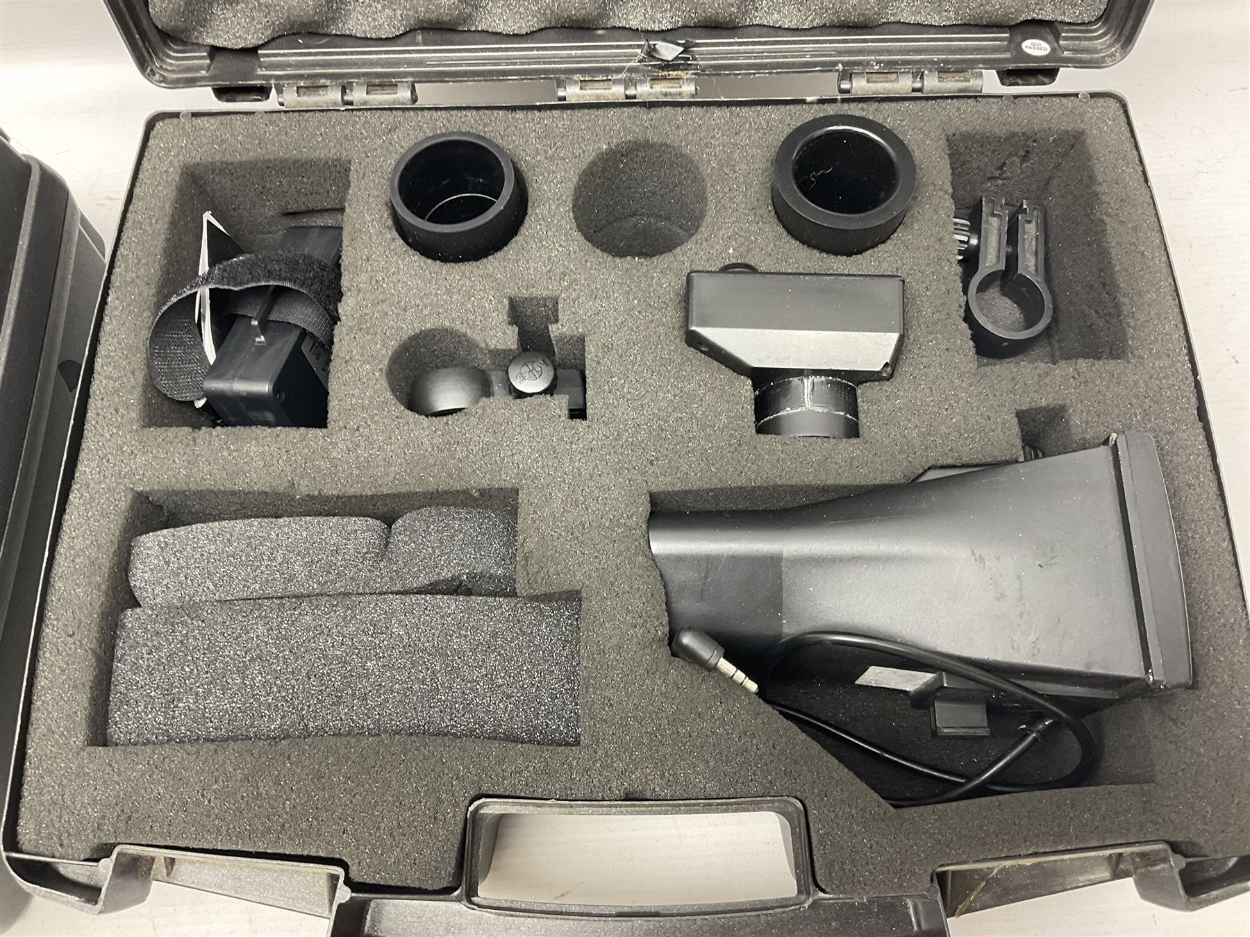 Two Nite-Site add-on kits in hard plastic carrying cases; one with charger