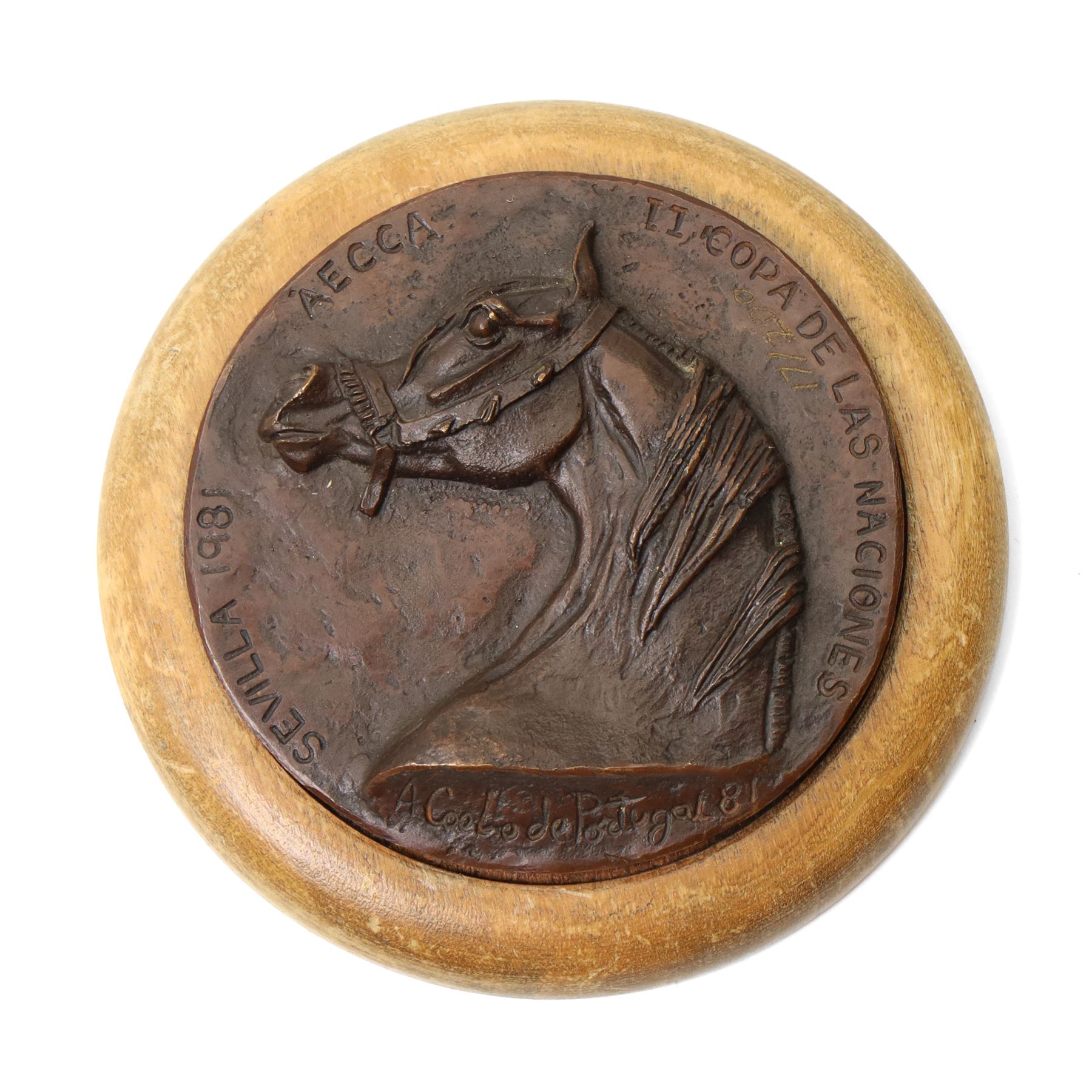 Two commemorative bronze medallions, each depicting horses, the first with 'Salon du Cheval Paris 1975 - Juge' plaque, the other from the Asociación Española de Criadores de Caballos Árabes, together with further decorative composite animals, including a cat after  Emmanuel Frémiet, and others (7)