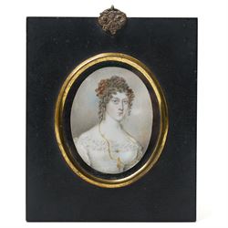 19th century miniature half length portrait on ivory of a lady wearing a gold locket, ebon...