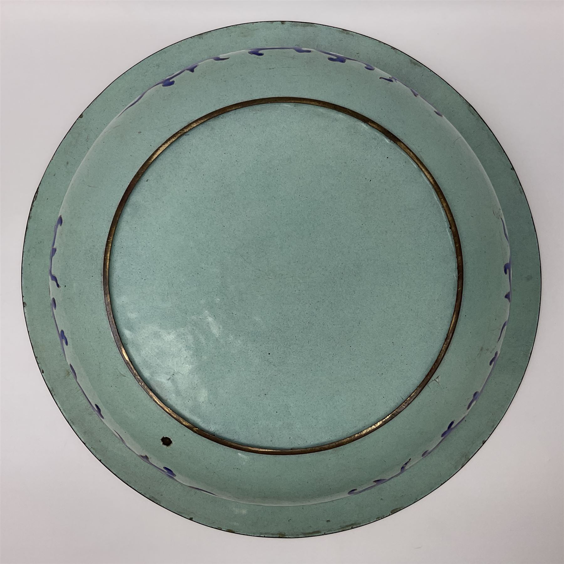 18th/19th century Chinese Canton enamel basin, the circular basin with flat everted rim, decorated with scrolling foliate and fruit decoration on a blue ground, D43cm