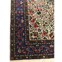 Persian beige ground rug carpet, central medallion with floral field and border, 185cm x 125cm 