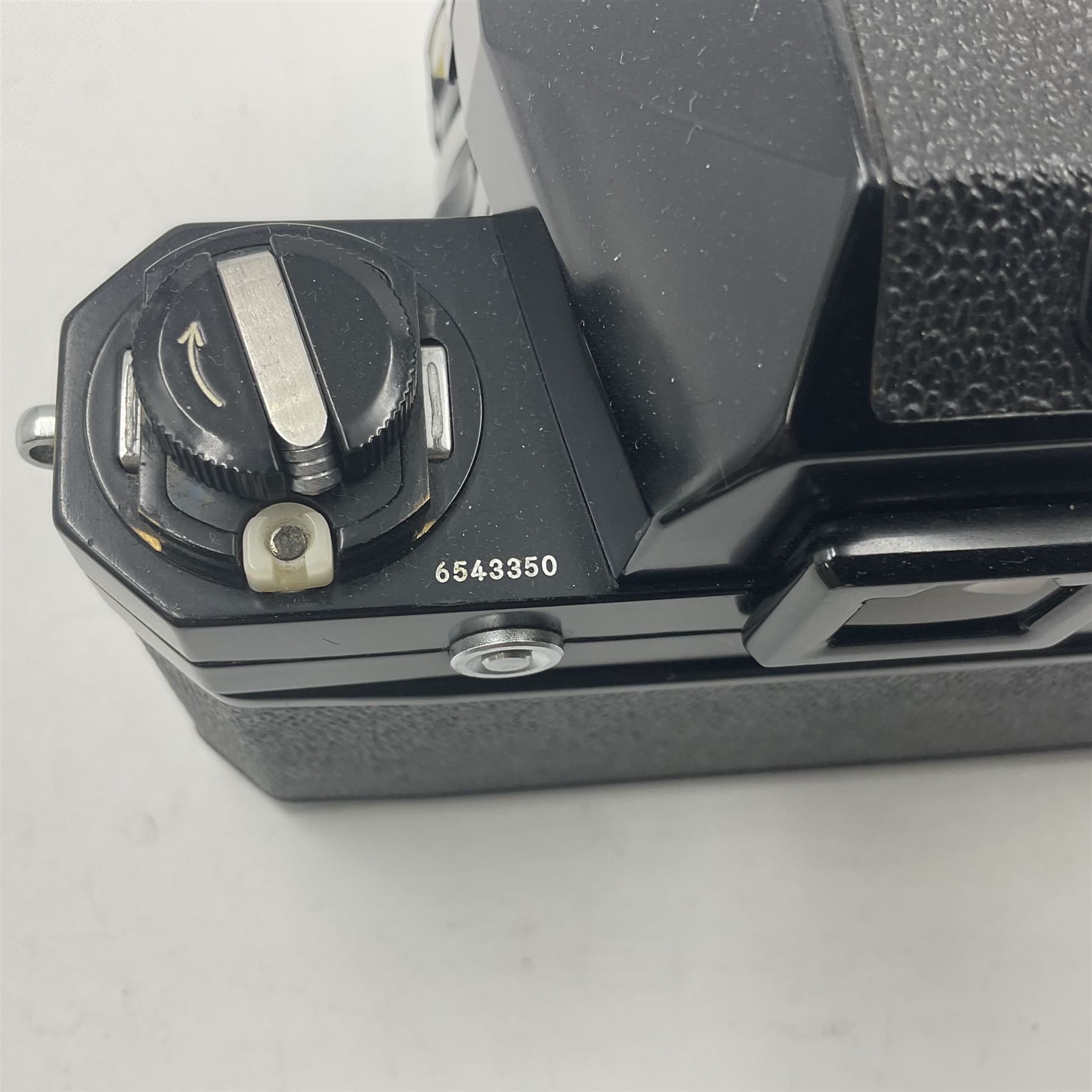 Nikon F Photomic camera body, serial no. 6543350, circa 1964, with 'Nikon NIKKOR-H Auto 1:2 f=50mm' lens, serial no. 1002112