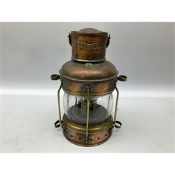 Copper and brass ship’s lamp marked ‘Anchor’, H25cm, Feuer hand storm lantern, Bialaddin Model 315 paraffin lamp and an Anchor lamp (4)