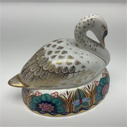 Two Royal Crown Derby paperweights, comprising Amazon Green Parrot, limited edition 1639/2500, with gold stopper and White Swan, with silver stopper, both with printed mark beneath and original box
