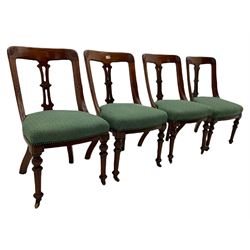 Set of four Victorian mahogany spoon back dining chairs, upholstered seats