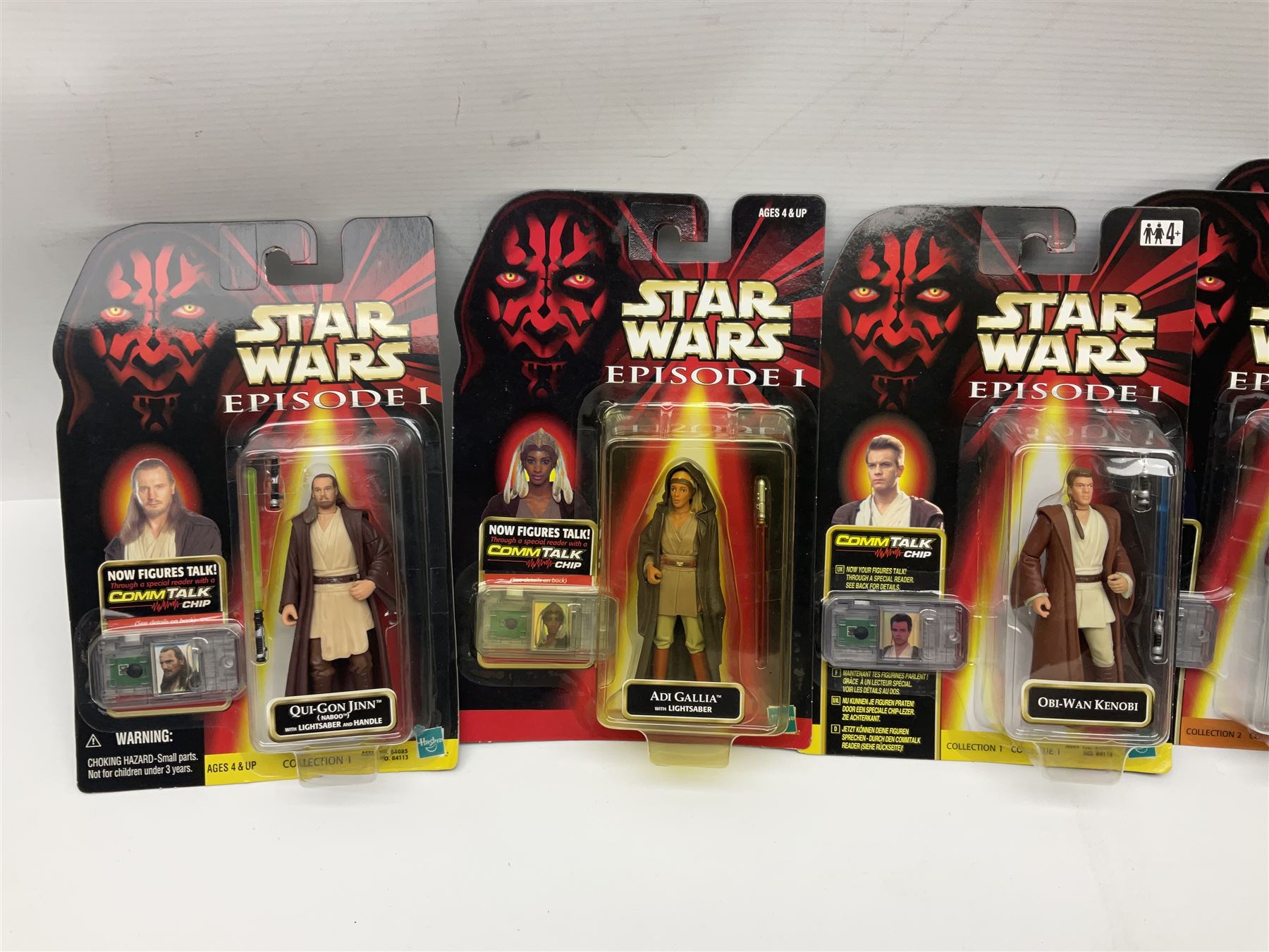 Star Wars - twenty-four Star Wars Episode One figures in card backed packaging; Collections 1, 2 and 3 with Electronic Commtalk reader for each figure's commtalk chip.