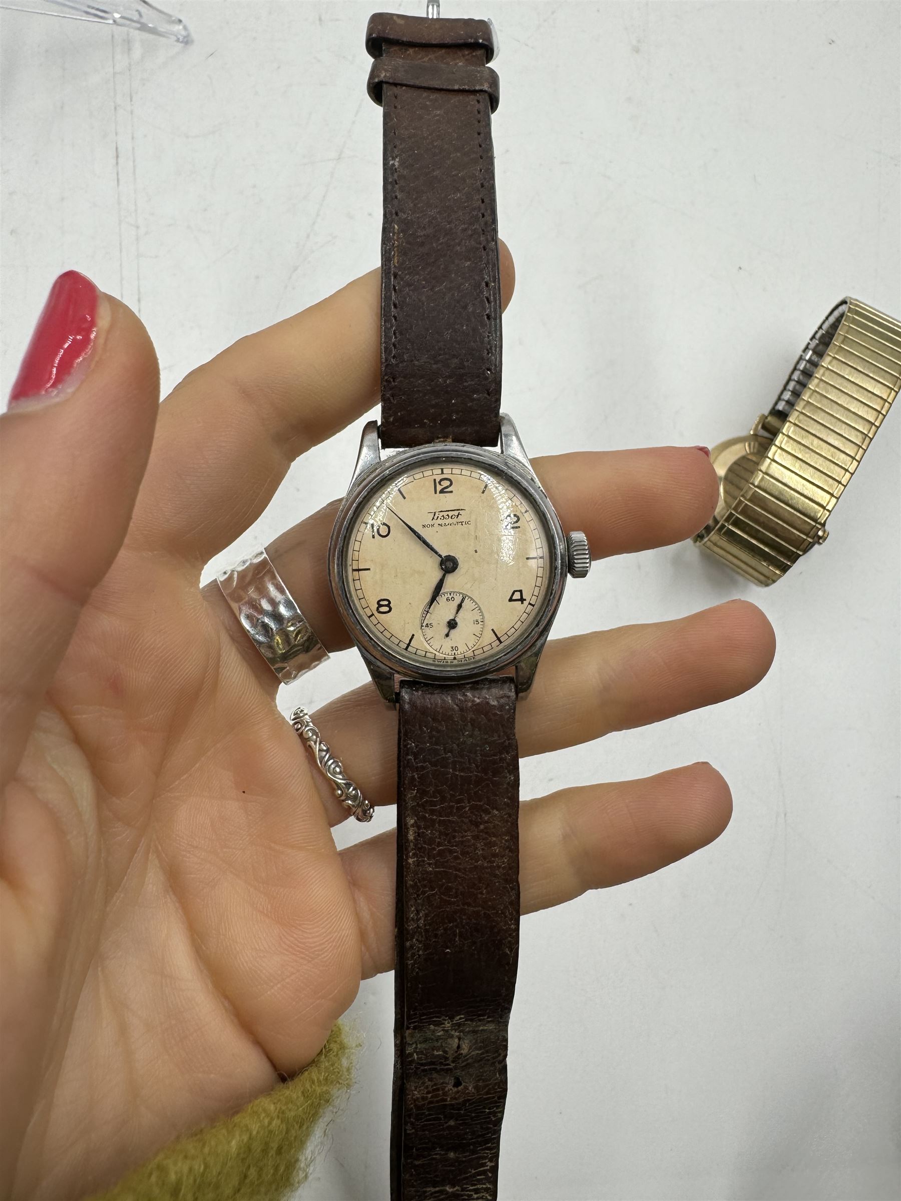 Smiths Astral gentleman's 9ct gold manual wind wristwatch, on expanding gilt bracelet and a Tissot stainless steel wristwatch