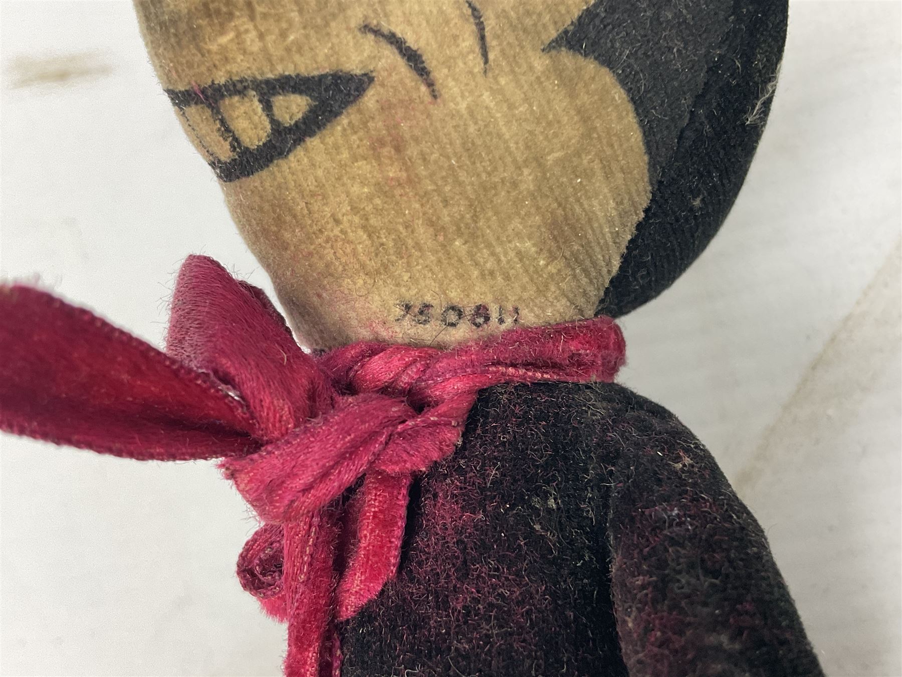 Deans Rag Book Mickey Mouse soft toy, circa 1930's, black velveteen head and body, with cream face and hands, red shorts and yellow felt shoes, marked Reg. No. 750811 to neck H19cm