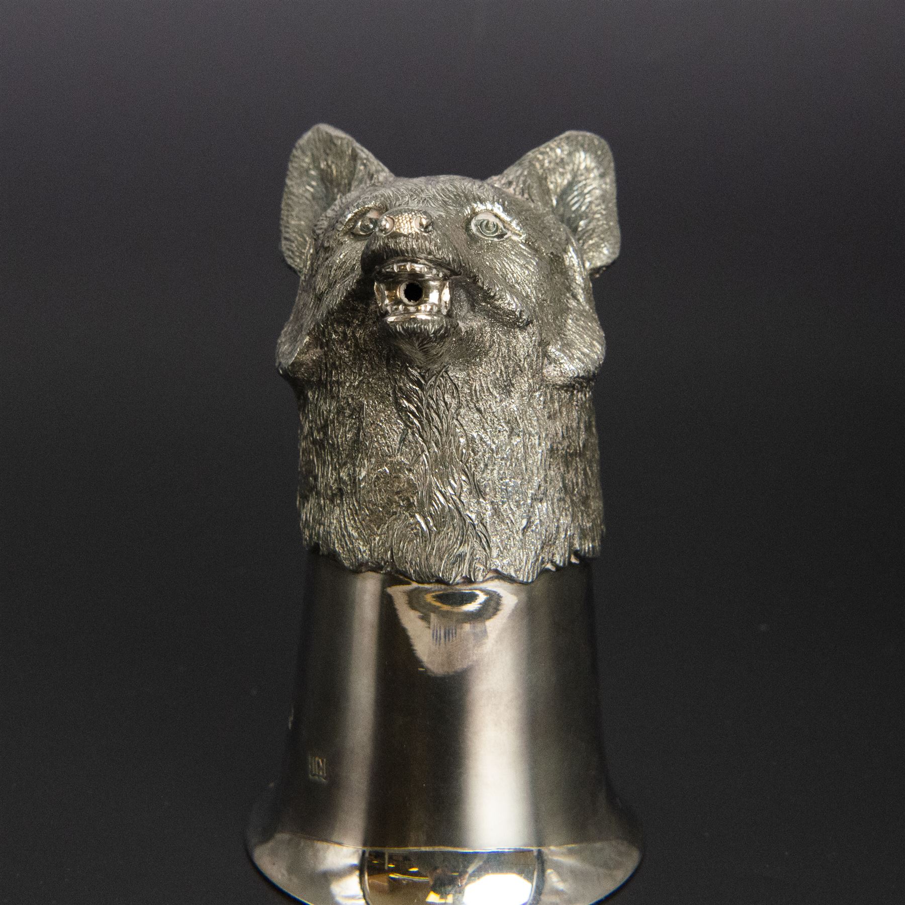 Late 20th century silver stirrup cup, modelled as a fox head to a cup of plain fluted form, hallmarked Royal Irish Silver Co, Sheffield 1971, H11.5cm