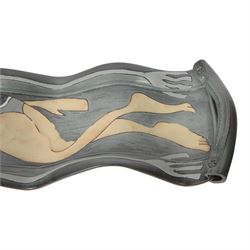 Studio pottery twin handled platter, of waved form, decorated with a female swimmer, L84cm, D22cm