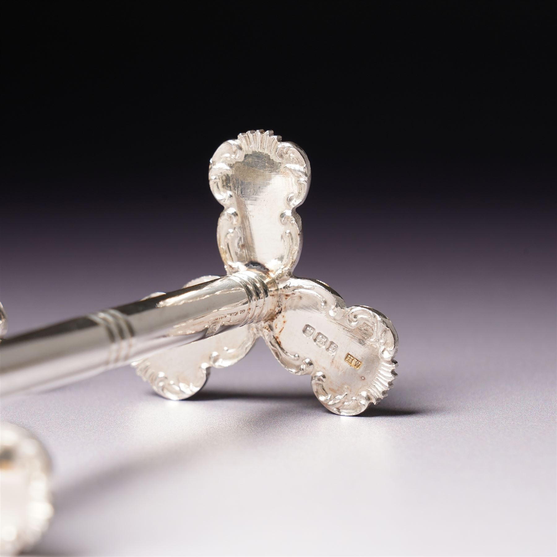 Pair of late Victorian silver knife rests with scroll moulded decoration Sheffield 1898 Maker Lee & Wigfull in original leather box for A & J Thompson, Scarborough 