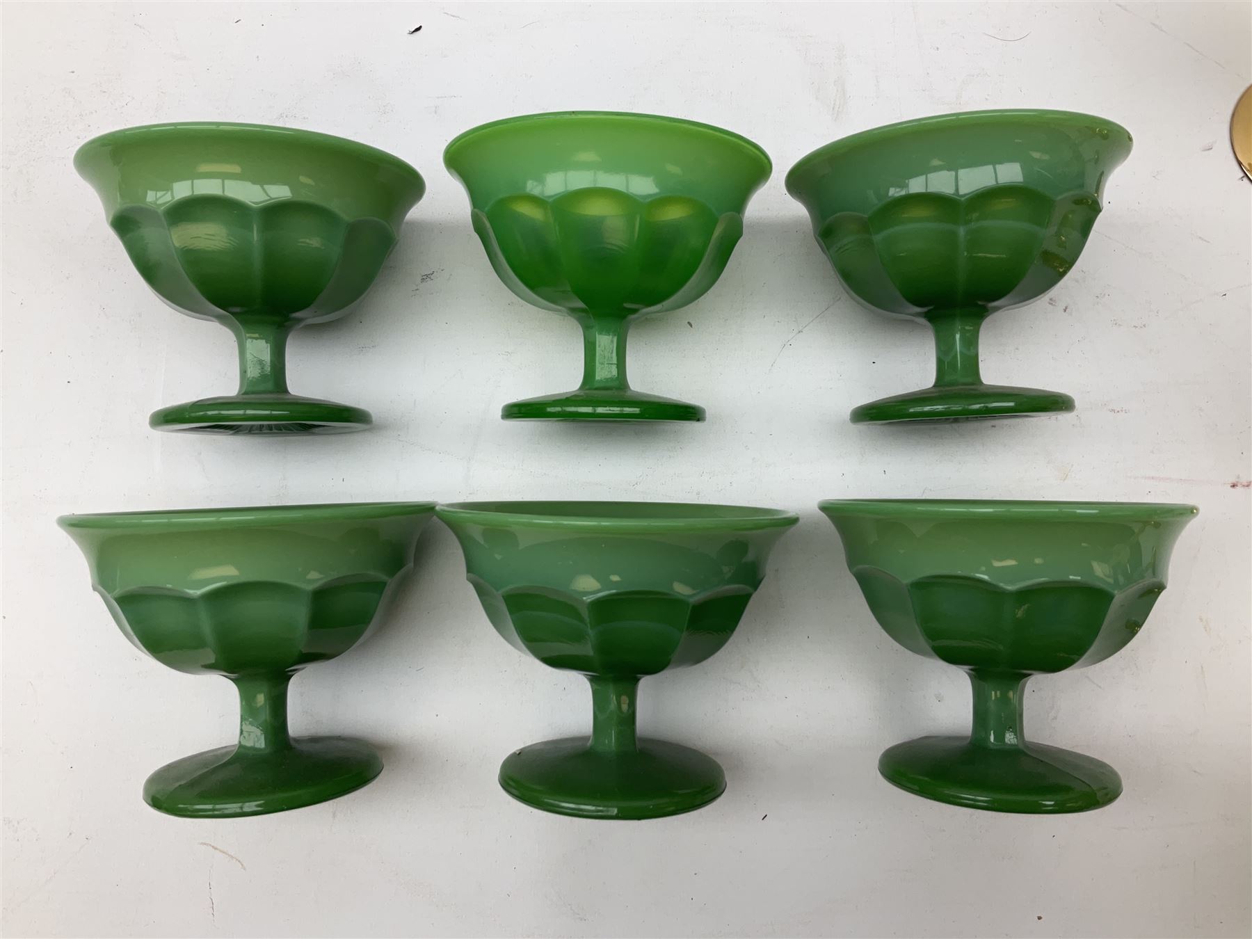 Set of six Art Deco style green glass sundae dishes, H9cm along with set of six Bohemian style glasses with twisted gilt stems