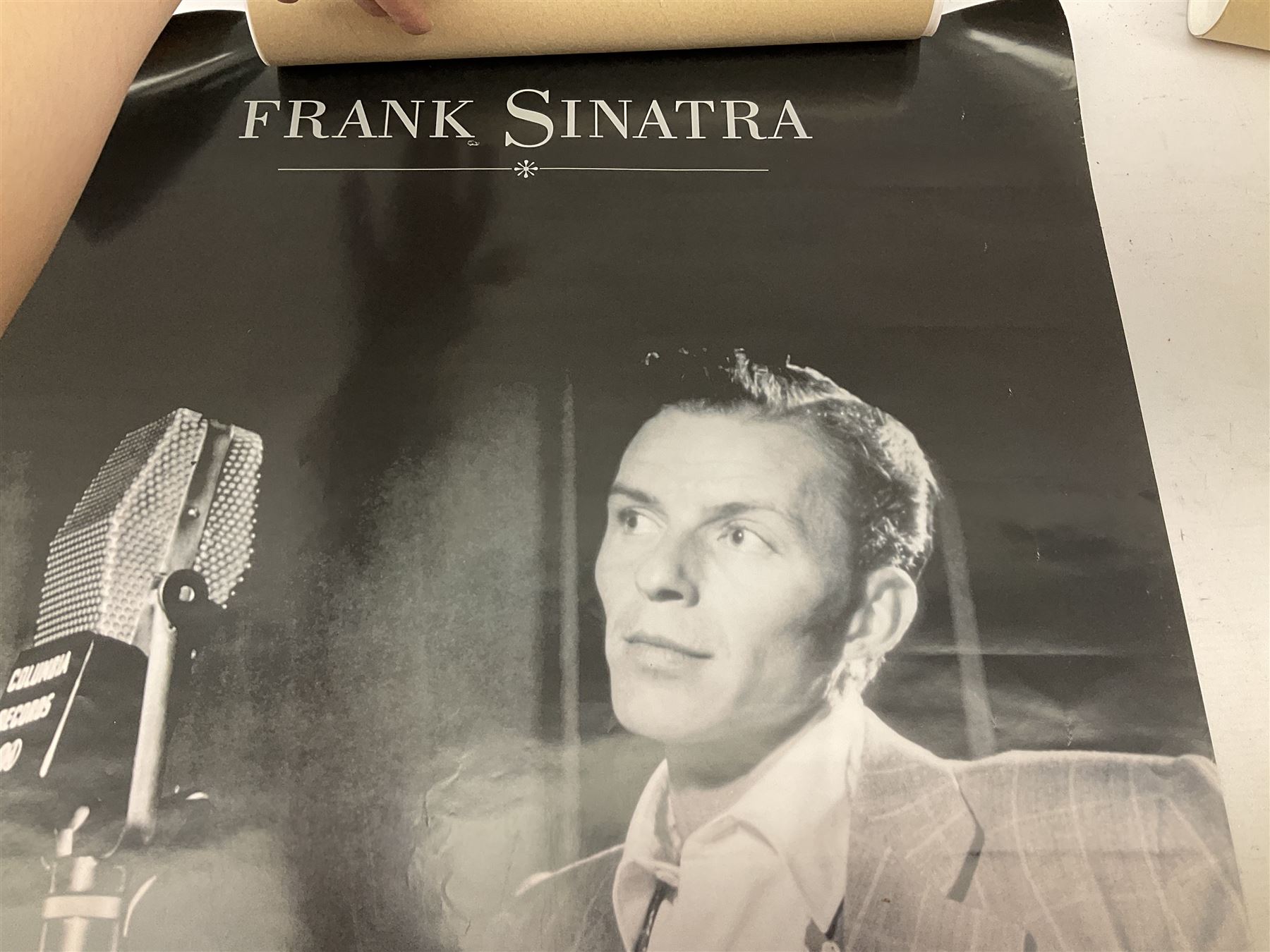 Three unframed posters - John Lennon, Frank Sinatra and Charlie Chaplin; quantity of unframed prints including The Shell Collection portfolio; and a framed print
