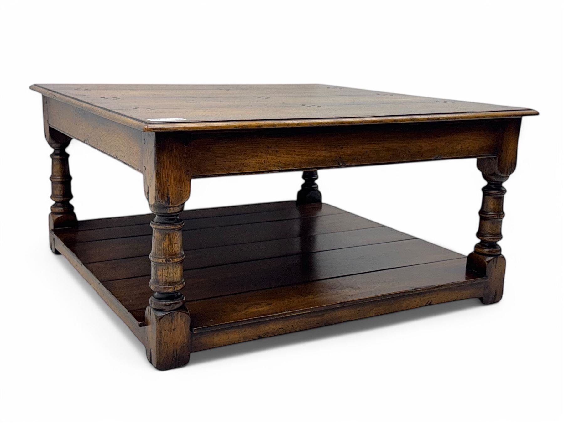 Oak coffee table, square moulded top on turned supports united by undertier 