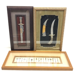  Three framed displays of decorated miniature Oriental knives, 73cm x 30cm and a Dragon sword (3)  