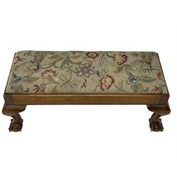 20th century mahogany rectangular footstool, needlework upholstered drop-in seat, on ball and claw carved feet (W81cm, D35cm, H34cm); 19th century elm stool, needlework upholstered drop-in seat, on square moulded supports united by plain stretchers (W45cm); 19th century walnut stool, shaped top upholstered in needlework, on cabriole supports (W50cm); 19th century rosewood stool, upholstered drop-in seat, on curved x-framed supports united by turned stretcher (W47cm)