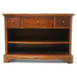 Willis & Gambier - curved sideboard, curved rectangular top, above three frieze drawers with brass pulls over two open recesses, on bracket feet 