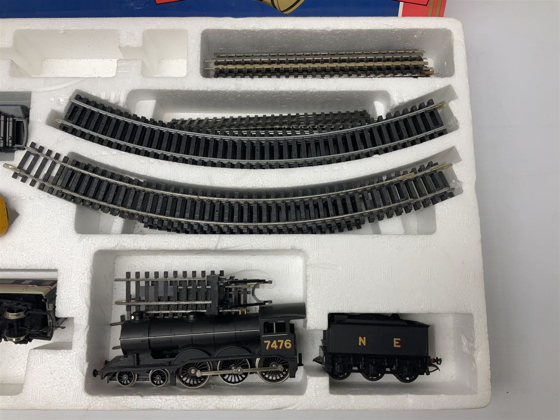 Hornby '00' gauge - Intercity 125 2-car set Nos.43010 & 43011 with one coach in original box with track and additional 4-6-0 locomotive and tender No.7476 and goods wagon; and another similar HST Intercity 125 2-car set Nos.43125 & 43126 with two coaches in original box with track and controller (2)