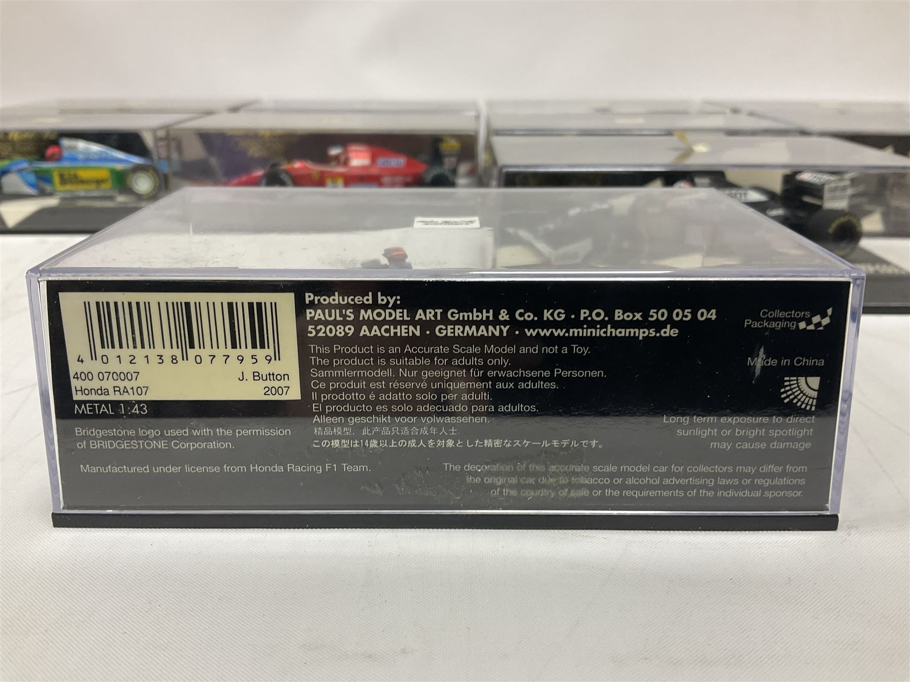 Pauls Model Art Minichamps Formula - ten 1:43 scale die-cast models of racing cars in plastic display cases (10)