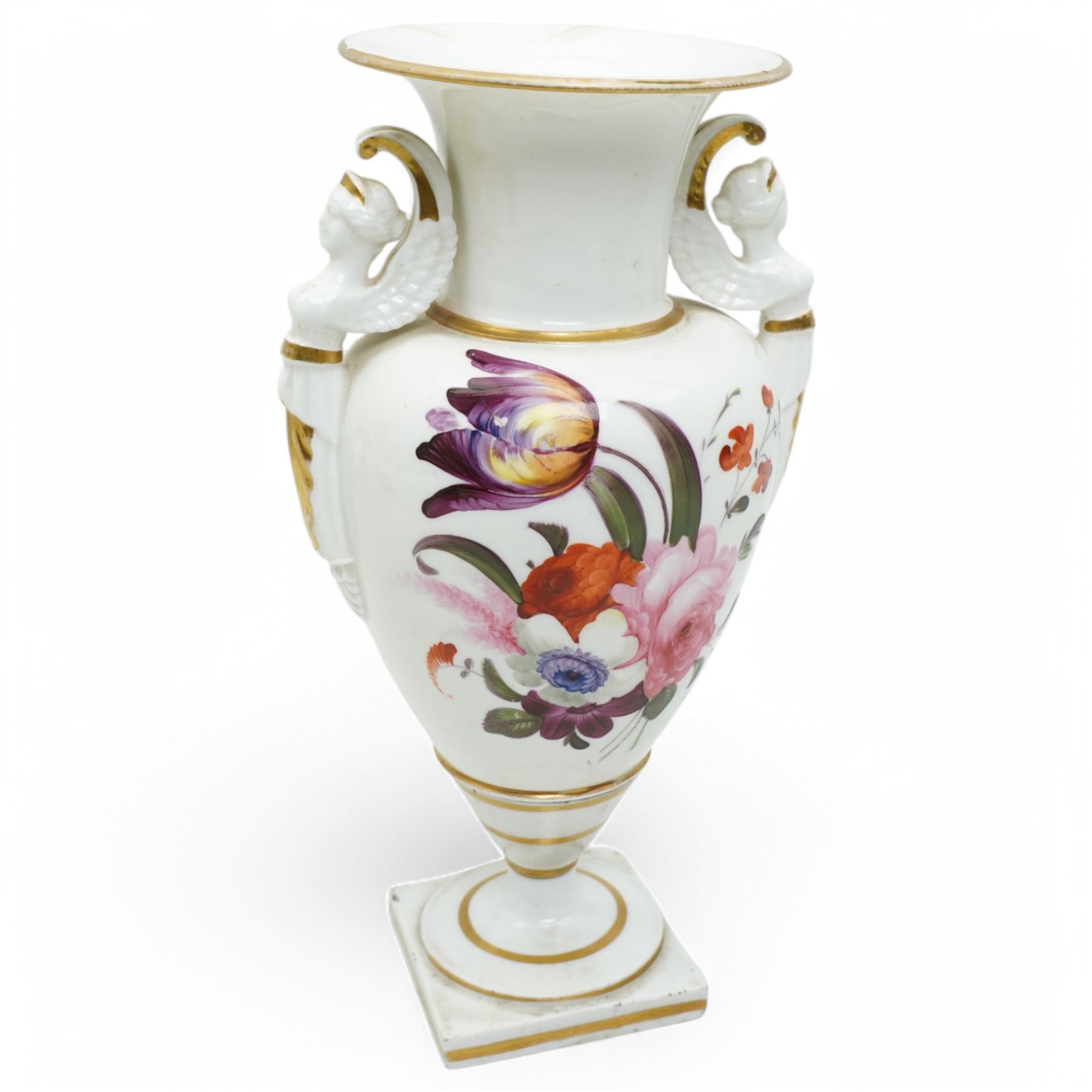 Early 19th century porcelain baluster vase, hand painted with roses, tulips etc having winged caryatid handles, H27cm. Old paper label from D.M. &  P. Manheim inscribed 'Derby'