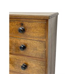 Georgian oak chest, fitted with two short over three long drawers, with ebonised turned handles 