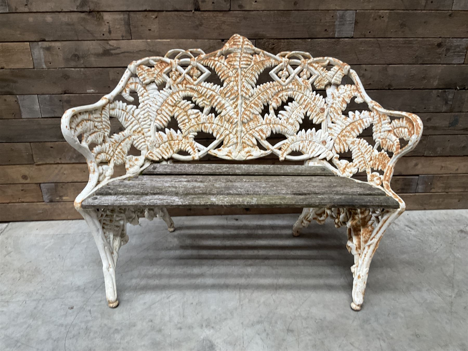 19th century cast iron Coalbrookdale design garden bench, elaborate fern leaf motif, slatted timber seat 