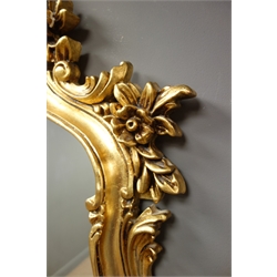  Ornate gilt scroll framed arched mirror, W112cm, H117cm  
