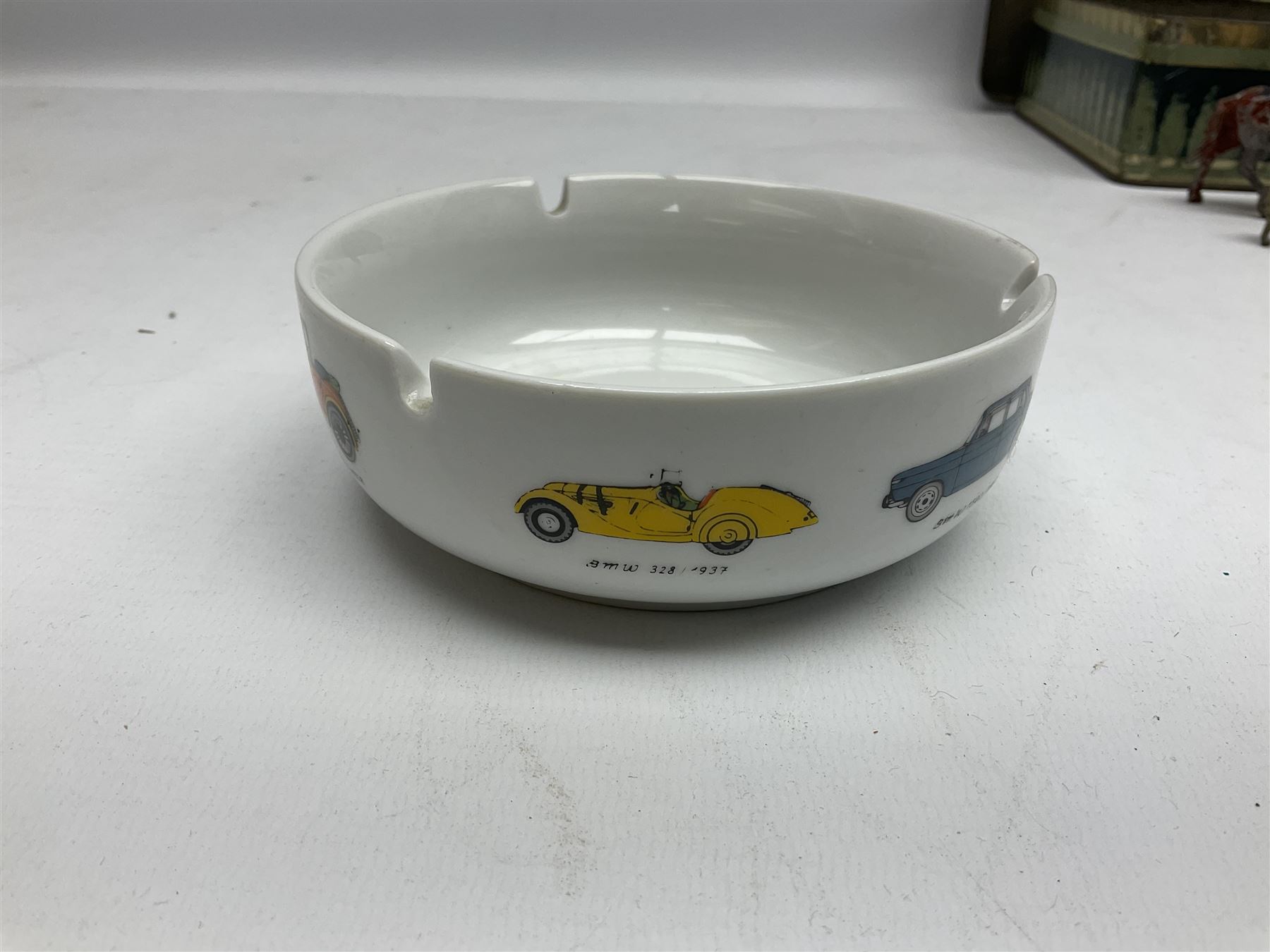 Chad Valley clockwork Fordson Major Tractor, a group of play worn Britains and other lead and metal farm animals, figures and accessories including a kennel, haystacks, dovecote, cows, sheep etc, together with a diecast model of a Tandem Bike L31cm