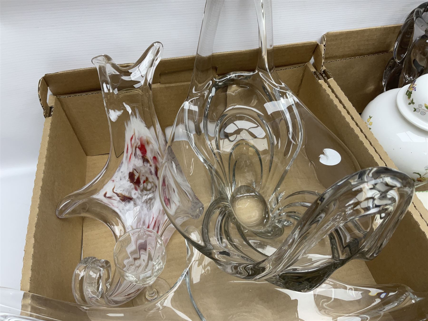 Four pieces of art glass, including twin handled basket bowl, etched glasses and matching decanter and a collection of other ceramics and glassware, in three boxes