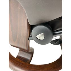 Ekornes Stressless - swivel reclining armchair with adjustable headrest, upholstered in cocoa brown leather, with matching footstool