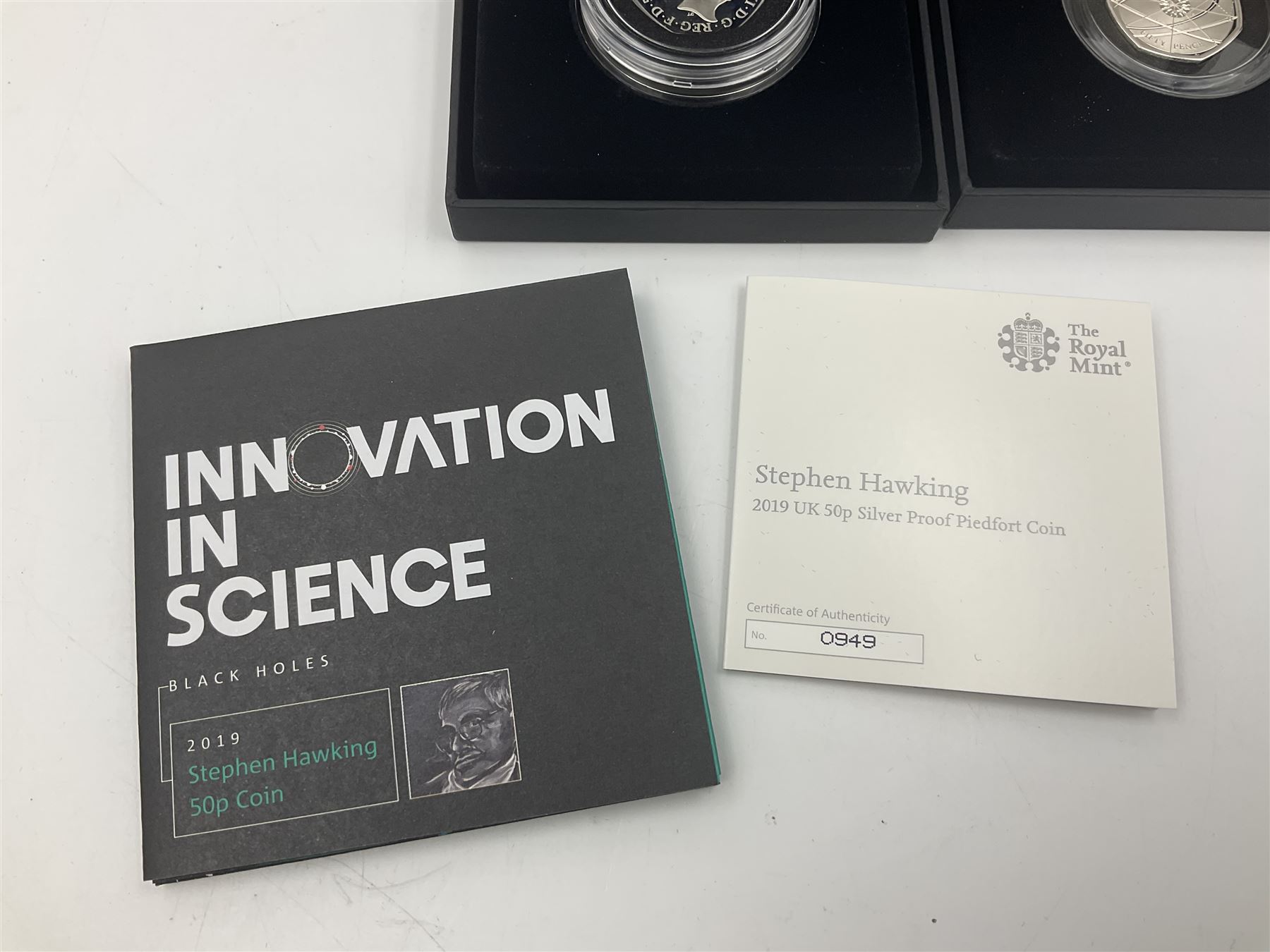 Three The Royal Mint United Kingdom silver proof piedfort fifty pence coins, comprising 2017 'Sir Isaac Newton', 2019 'A Celebration of Sherlock Holmes' and 'Celebrating the Life of Stephen Hawking', all cased with certificates 