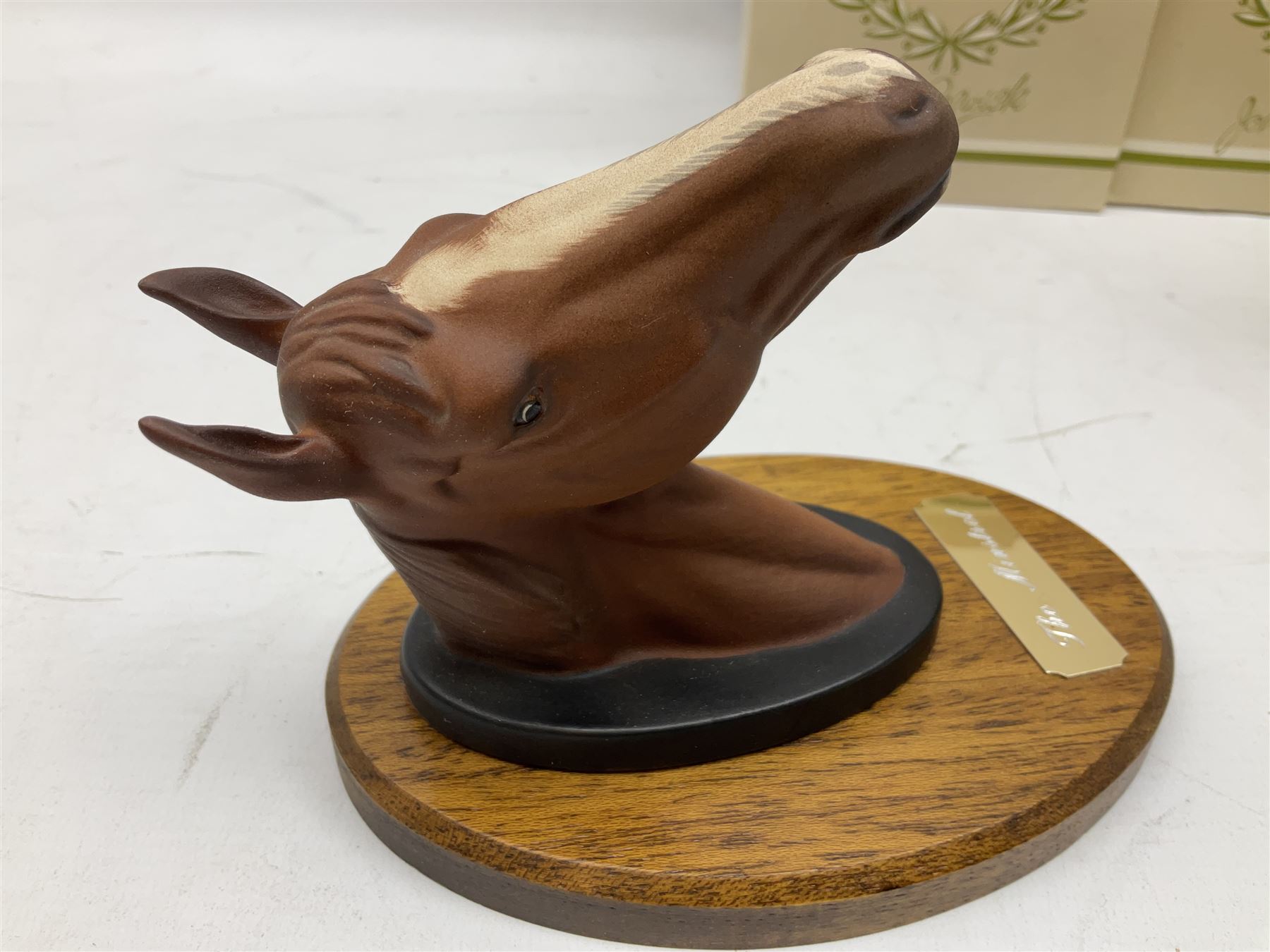 Beswick set of horse head wall plaques 'Champions all', comprising Arkle no.2700, The Minstrel no.2701, Red Rum no.2702, Troy no.2699, all with original boxes