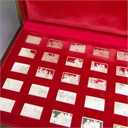 Elizabeth Our Queen silver ingots collection, twenty-five rectangular ingots each decorated in relief with a Royal scene, hallmarked John Pinches Ltd, London 1976, in wooden presentation case with information booklet