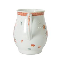 Mid 18th century Worcester mug, circa 1756-1758, of bell form with grooved loop handle, decorated in the Two Quail pattern in the Kakiemon palette with two birds and blossoming prunus trees amongst further flowers, sprigs and insects, bellow an iron red foliate border to rim, H12cm
