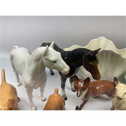 Quantity of Beswick to include double ash tray / candy bowl modelled with a bay horse, vase and figures to include bay foals, fox, cattle, etc, and a quantity of similar ceramic horse and animal figures including examples by Royal Doulton