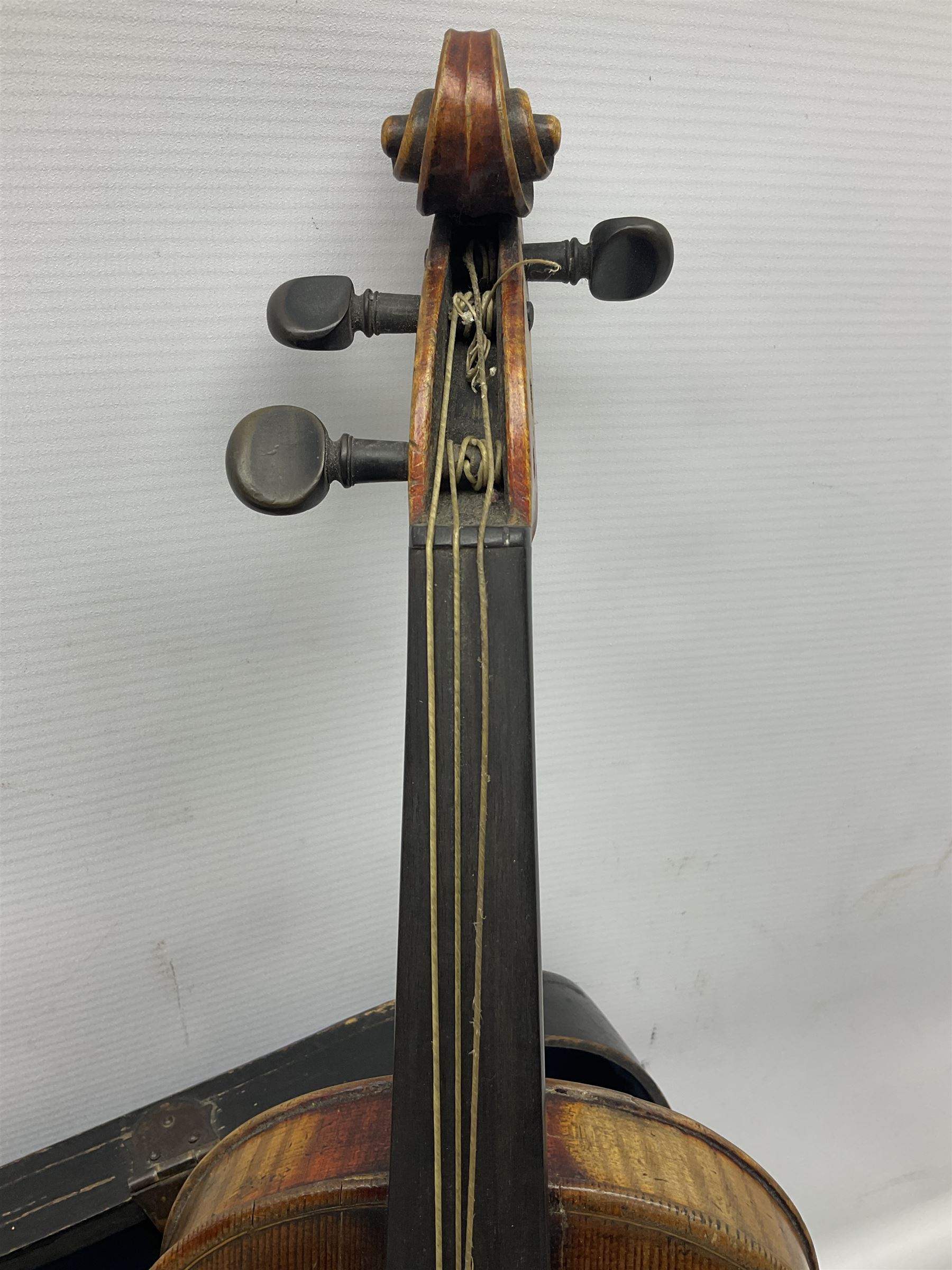 Late 19th century French three-quarter size 'Conservatory' violin with 34cm two-piece maple back and ribs and spruce top, the peg box inscribed 'Conservatory Violin Straduari', bears label 'Antonius Stradiuarius Cremonensis Faciebat Anno 1721' L55.5cm overall; in ebonised wooden 'coffin' case