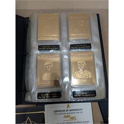 Star Trek collectables, including Danbury Mint '22ct Gold Card Collection', PCS Stamps and Coins Official US Postage Celebrating The Original Star Trek Series, Star Trek St Vincent and Grenadines first day cover collection, four stamp sets and a framed set of similar stamps, commemorative coins, Star Trek The Experience Las Vegas coin, three commemorative 'gold stamps' and three albums of collectors cards and telephone cards