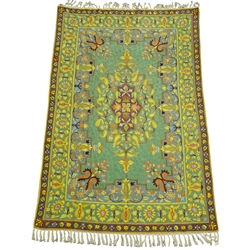 An Iranian lined silk tapestry wall hanging, the central oblong panel with floral motif in purple, yellow, green, orange and blue on a green ground within a stepped blue ground border of stylised motifs and two conforming outer borders W113cm L188cm Provenance: This lot was gifted to the vendor who worked for the Royal Family of Oman  