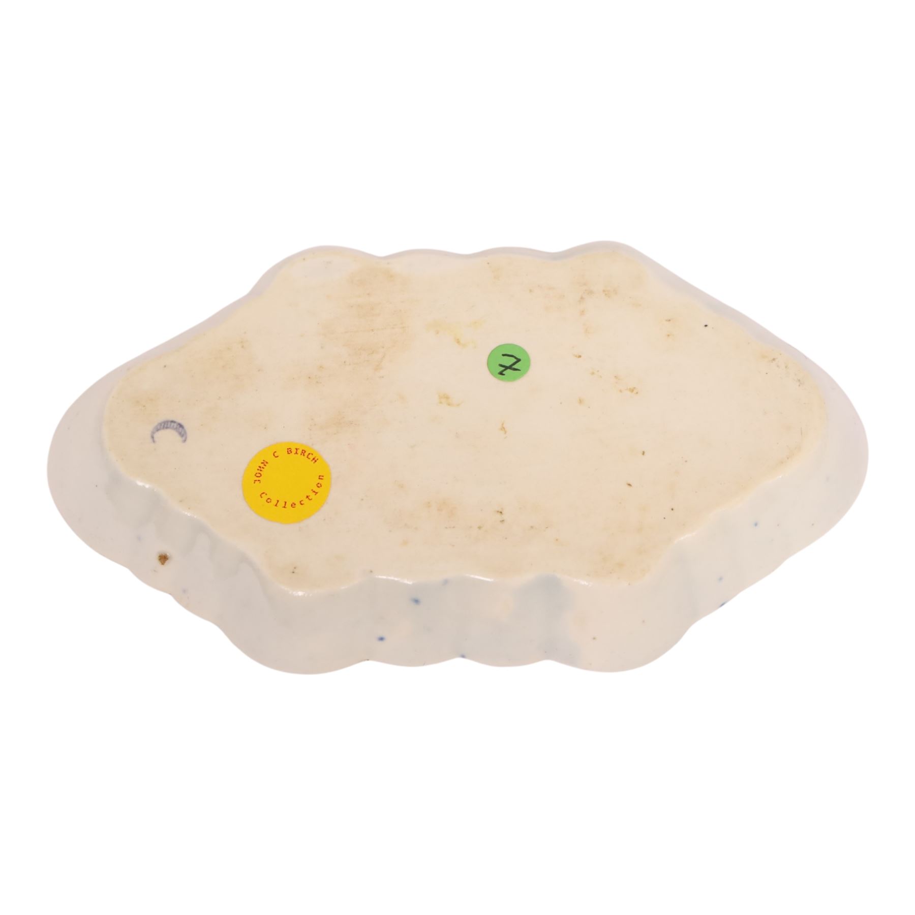 Worcester blue and white spoon tray, decorated in the Argument pattern, circa 1780-1785, L16cm, together with a Worcester blue and white bell shaped coffee cup with moulded scroll handle, decorated in the Man in the Pavilion pattern, circa 1760-1765, H6cm