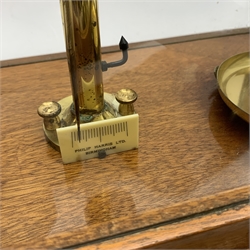 Set of brass laboratory scales by Philip Harris Birmingham in glazed mahogany cabinet with upward sliding front door and quantity of loose brass weights  W39cm H38cm; together with a set of late 19th century brass postal scales on mahogany serpentine base with inset weights W25cm (2)