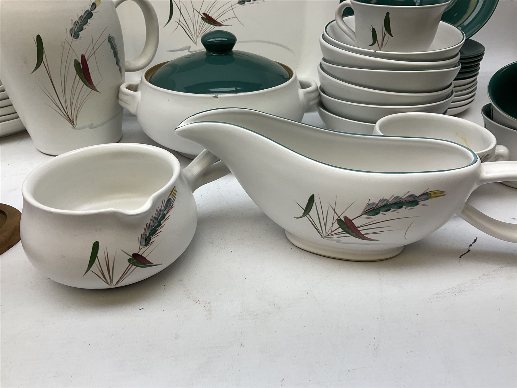 Denby Greenwheat pattern part dinner and tea service, to include six dinner plates, six side plates, six dessert plates, six bowls, four serving dishes of various sizes, teapot, two milk jugs etc (47)